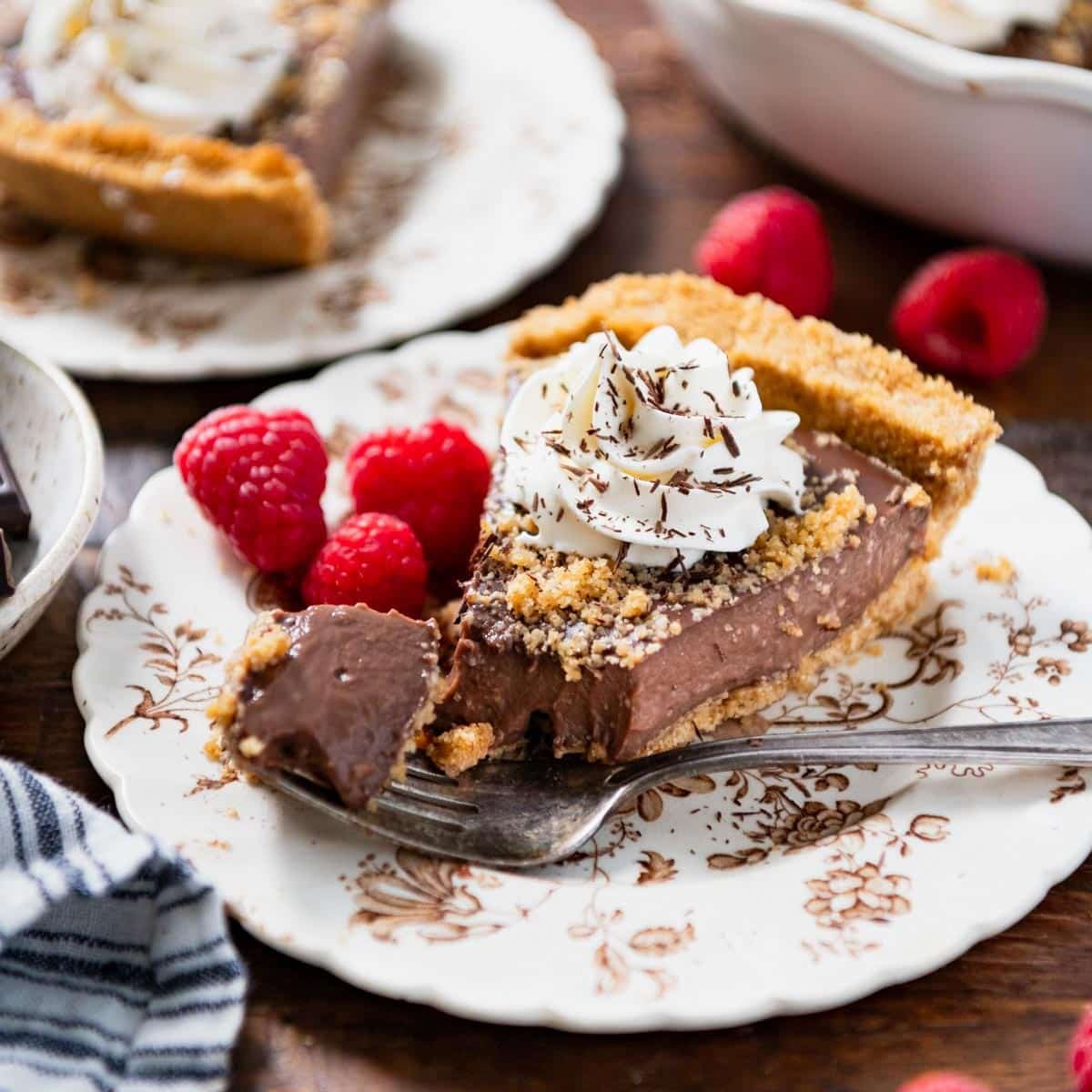 Bite of chocolate pudding pie on a fork.