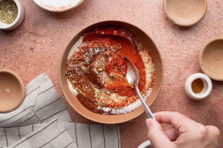 Stirring together homemade fajita seasoning blend.