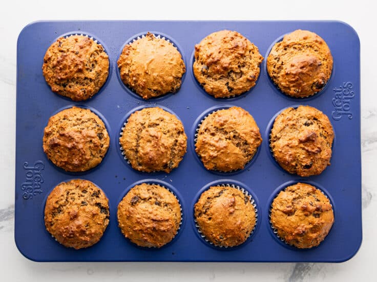 Overhead shot of baked bran muffins in a muffin tin.