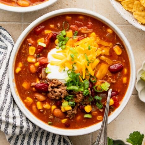 Square overhead shot of a bowl of easy taco soup.