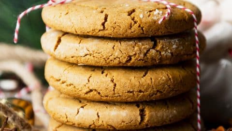 Square side shot of Williamsburg old fashioned ginger cookies on a wooden board.