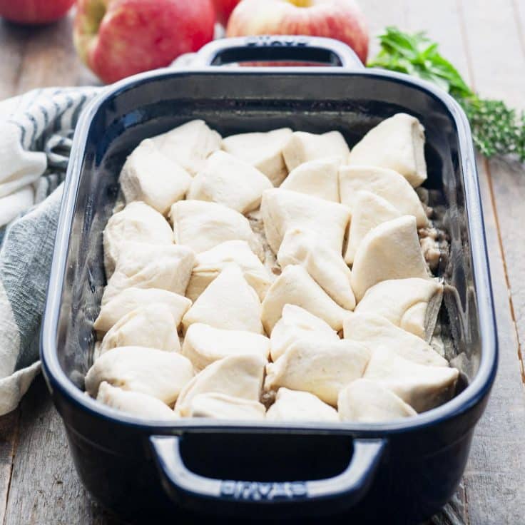 Biscuits and gravy breakfast casserole before it goes into the oven.