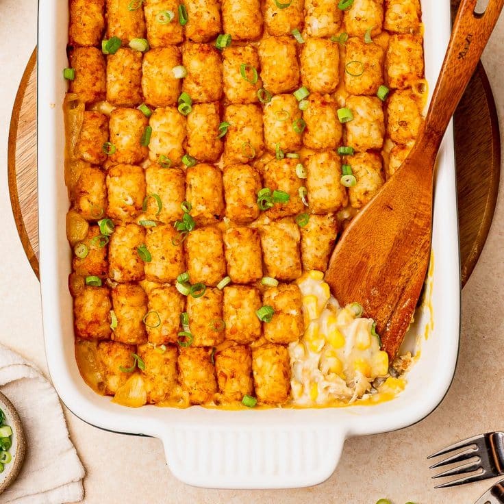 Square overhead shot of a dish of chicken tater tot casserole.