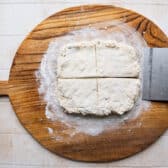 Biscuits dough cut into 4 quadrants.