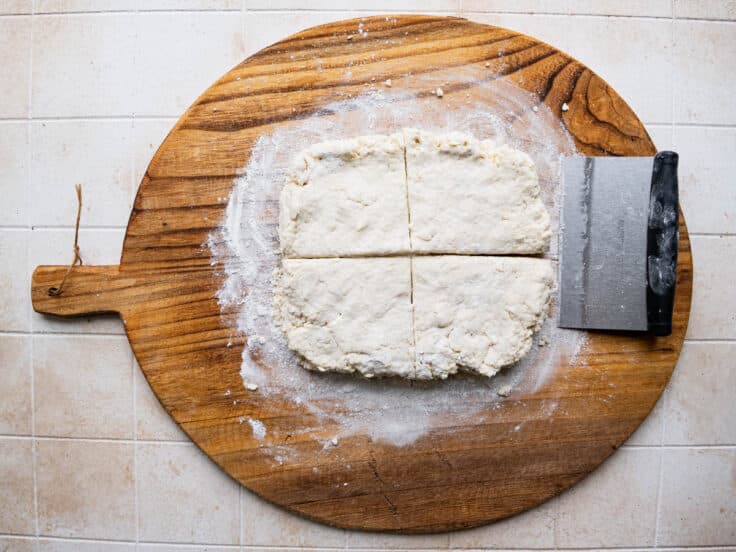 Biscuits dough cut into 4 quadrants.
