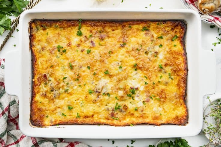 Horizontal overhead shot of a baked overnight breakfast casserole with Bisquick.