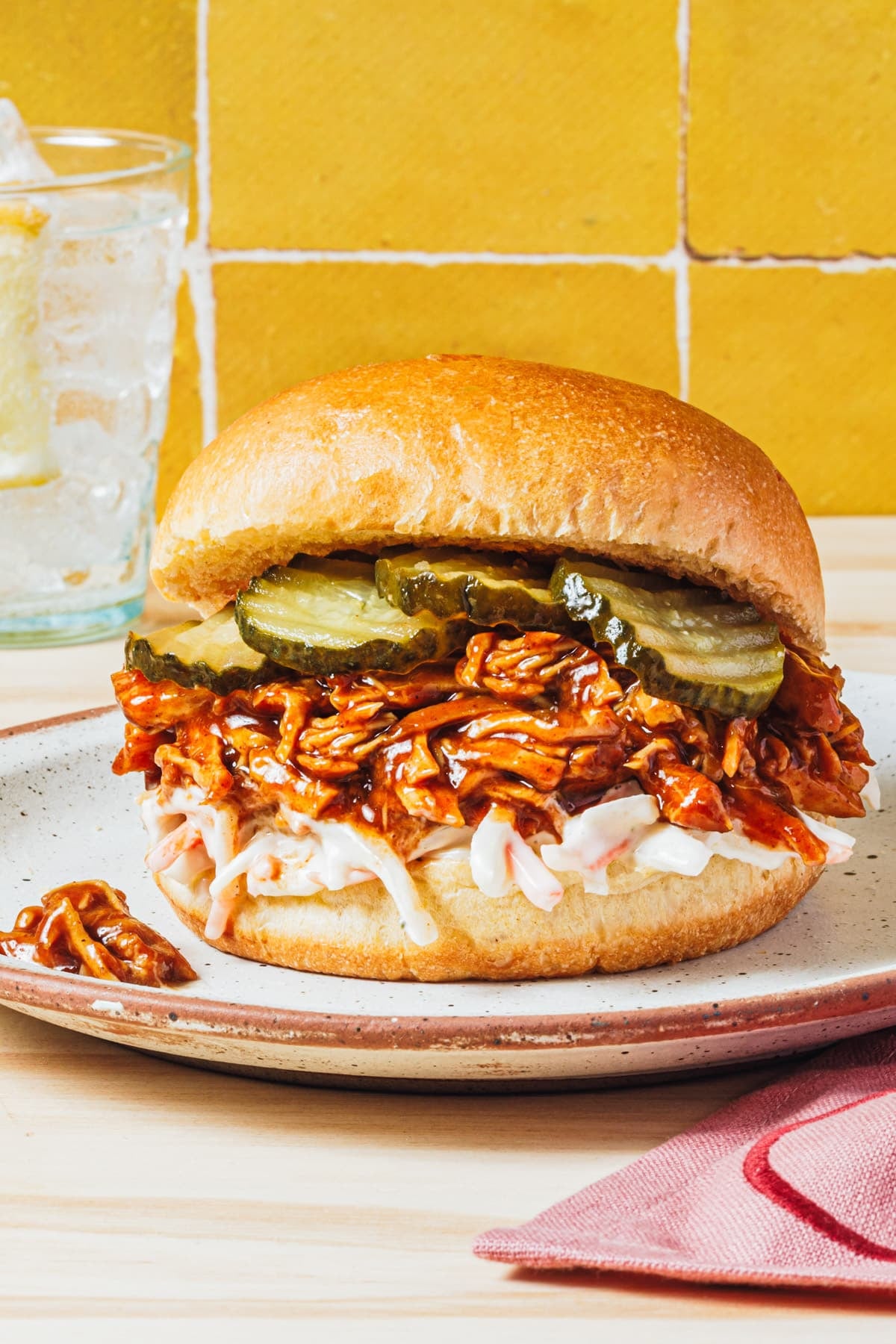 Crock Pot bbq pulled chicken sandwich on a plate.