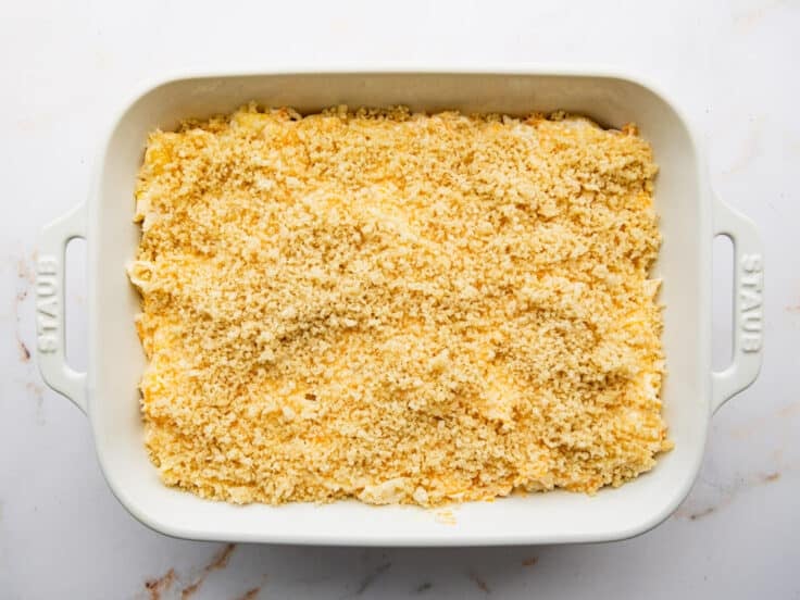 Breadcrumbs on top of the mac and cheese before it goes in the oven.