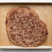 Baked cinnamon pecan bars after they come out of the oven before slicing.