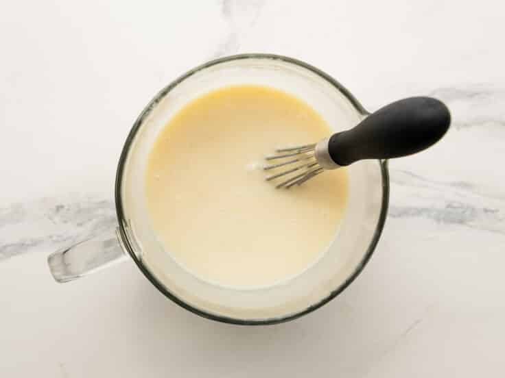 Whisking together the coconut cream soaking mixture.