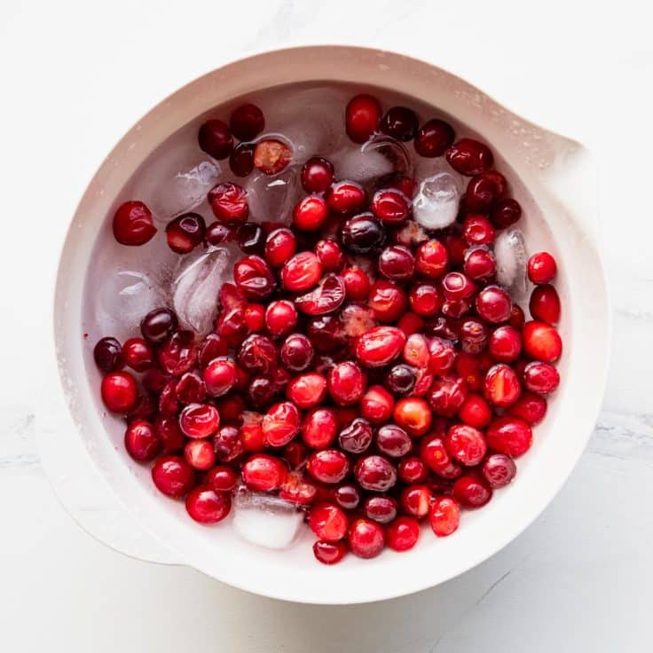 Cranberries in an ice bath.