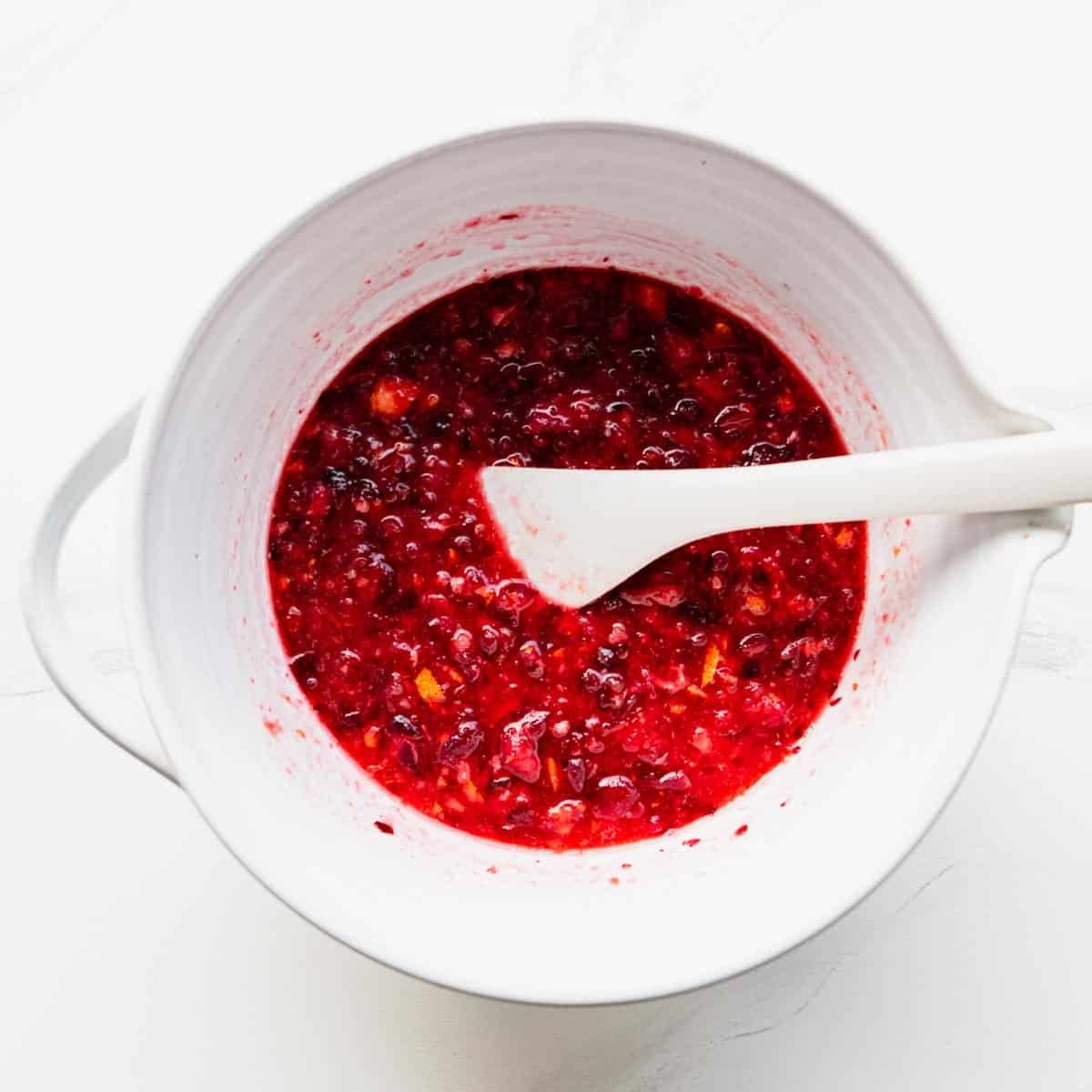 Process shot showing how to make cranberry relish with Grand Marnier.