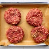 Hamburger patties for a hamburger steak recipe before cooking.