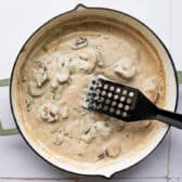 Making the mushroom gravy in the skillet.
