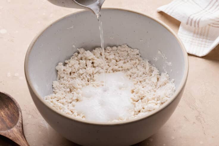 Adding the 7up to the bowl.