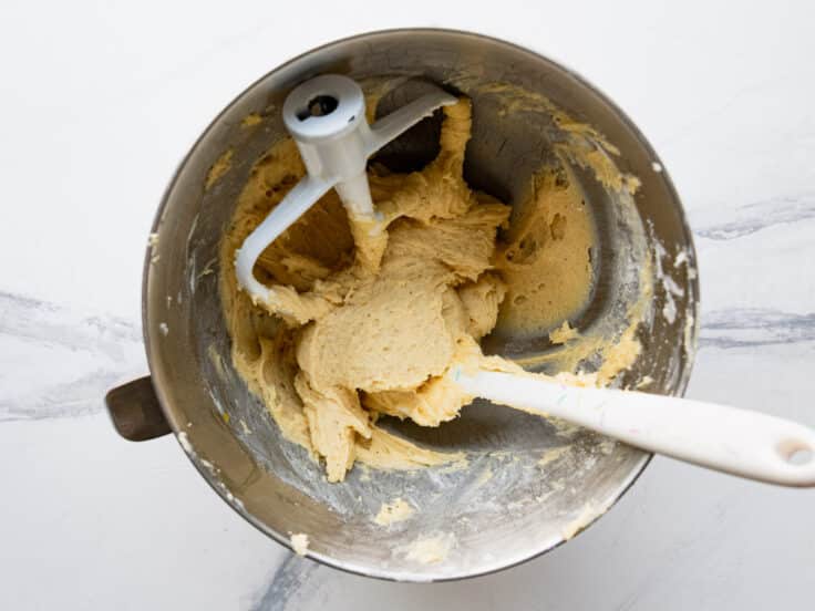 Overhead shot of breakfast cake batter in a large mixing bowl.
