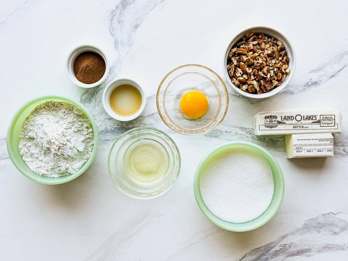 Ingredients for cinnamon pecan cookie bars.
