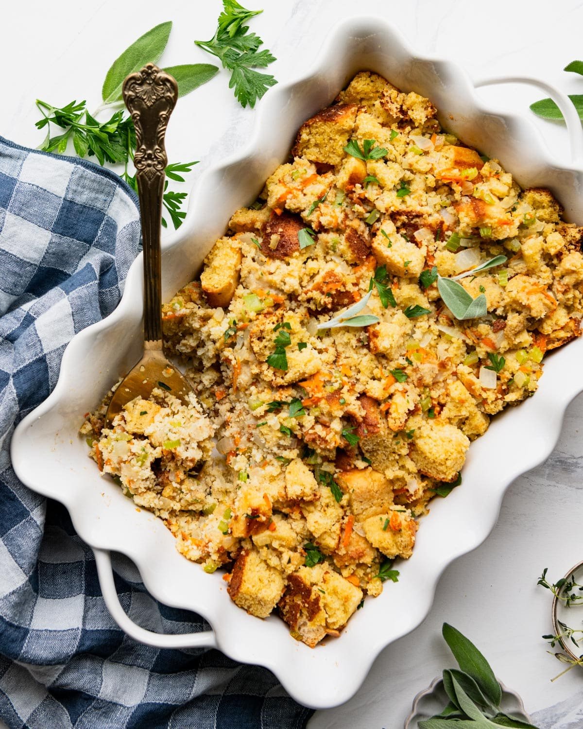 Overhead shot of a white dish full of Southern cornbread dressing.