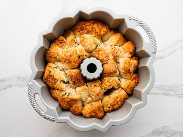 Baked pull apart garlic bread in a bundt pan.
