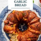 Pull apart garlic bread with a text title overlay.