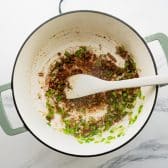 Blooming the spices for white turkey chili.