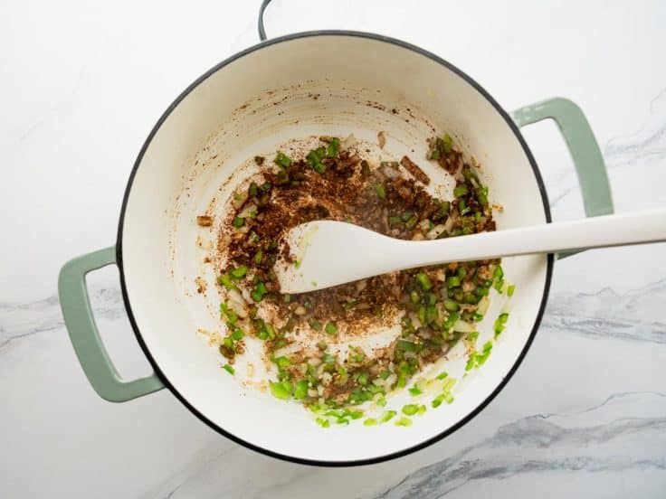 Blooming the spices for white turkey chili.