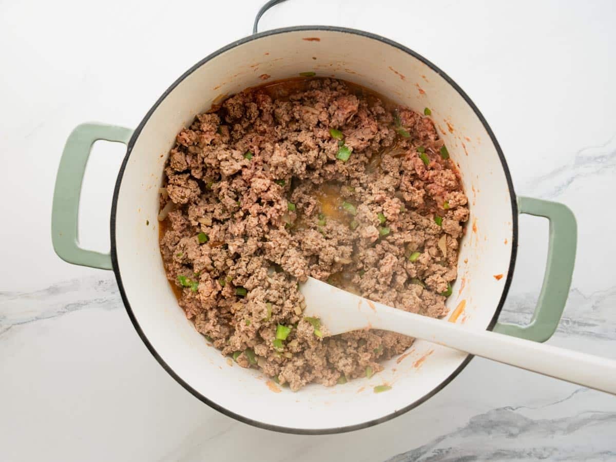 Cooking ground turkey in a pot.