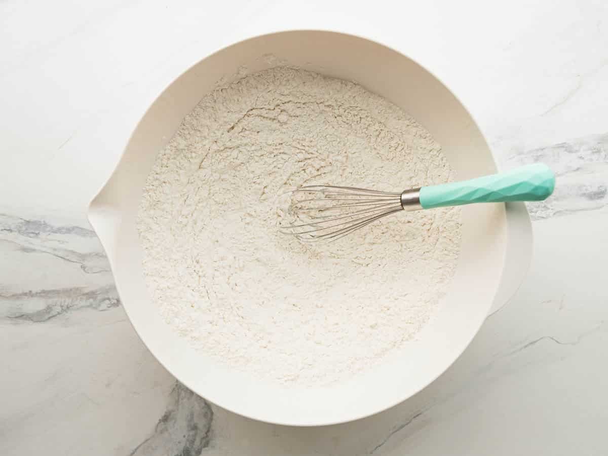 Whisking dry ingredients for a buttermilk pound cake recipe.