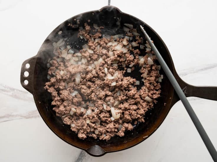 Browning ground beef with onion.