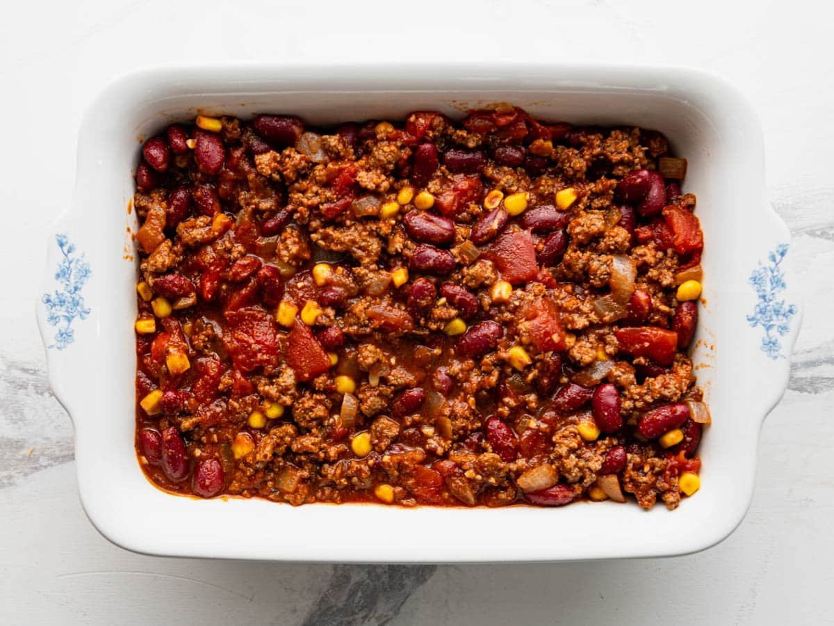 Chili spread in a casserole dish.