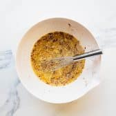 Cream custard for a cinnamon roll casserole.