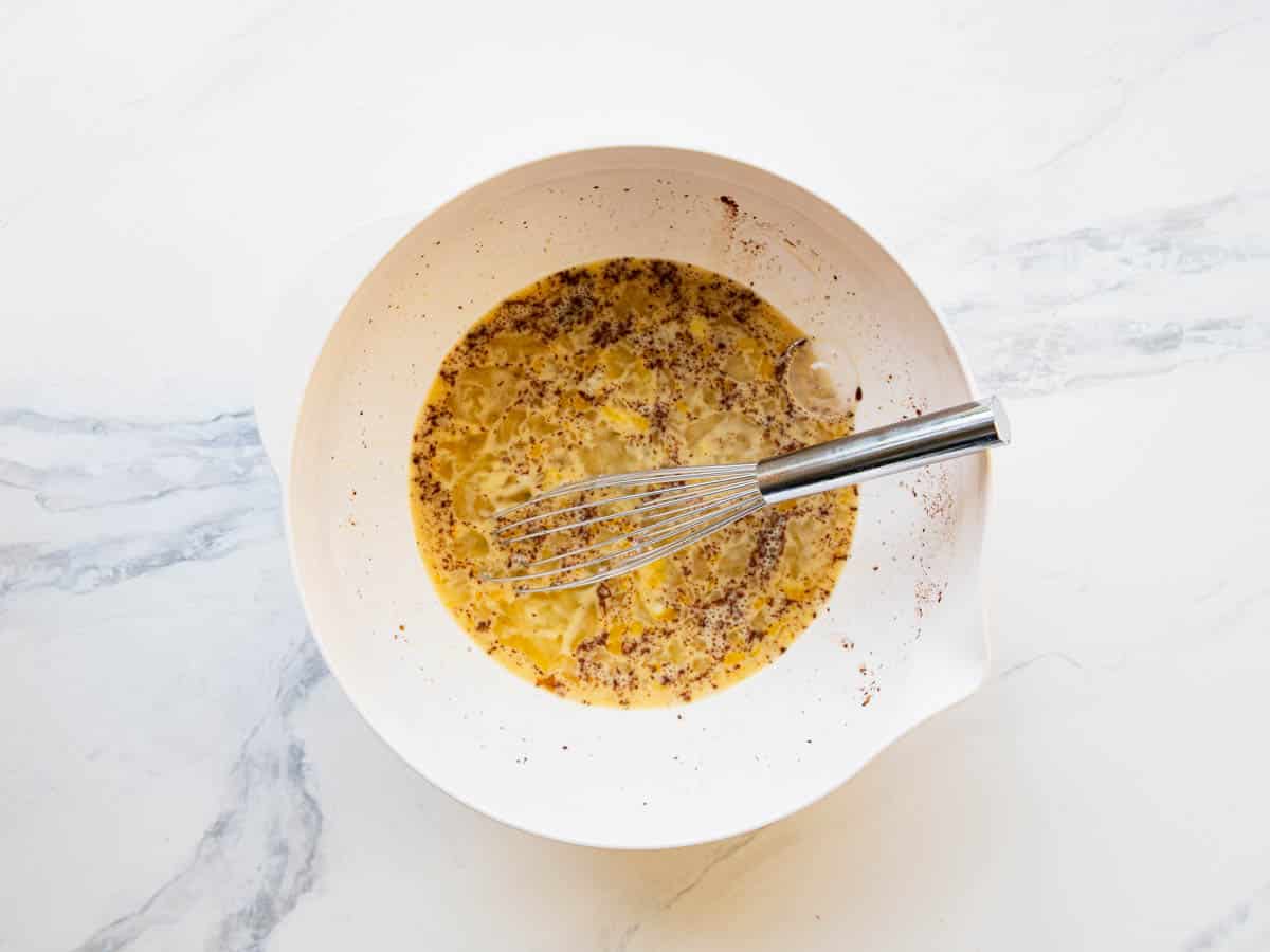 Cream custard for a cinnamon roll casserole.