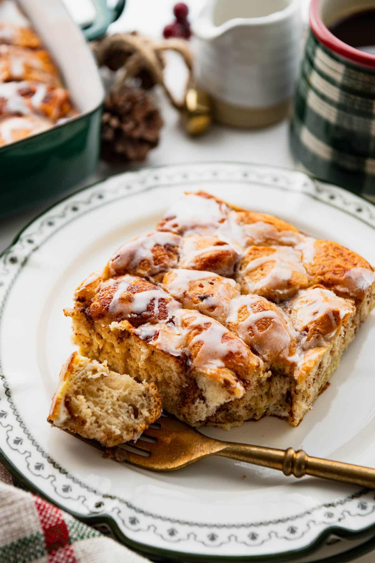 Close up side shot of easy cinnamon roll casserole on a holiday table.