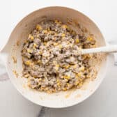 Stirring together the creamy beef filling.