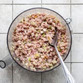 Ham salad ingredients in a food processor.