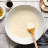 Making the sauce for a ham salad recipe.