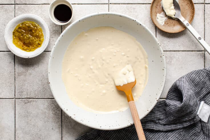 Making the sauce for a ham salad recipe.