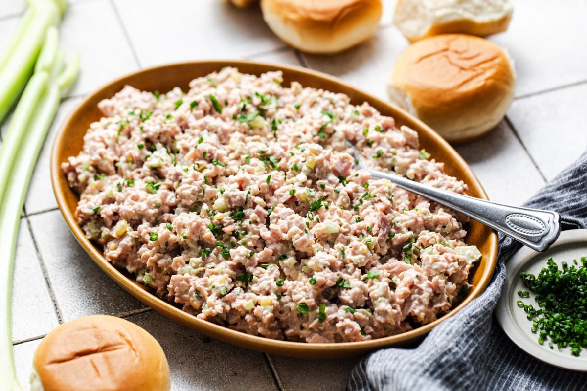 Horizontal side shot of ham salad in a bowl.