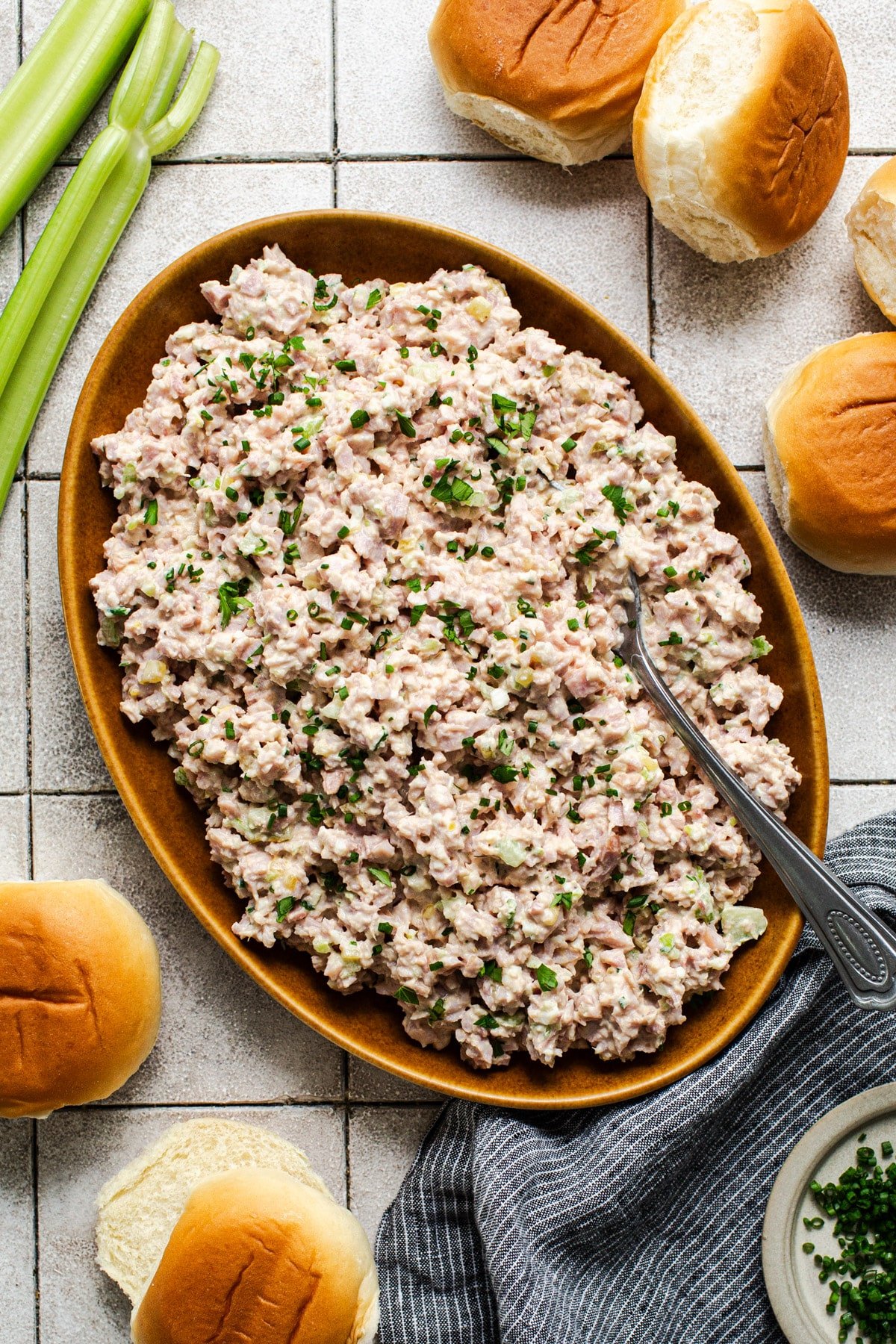 Overhead image of old fashioned ham salad in a wooden bowl.