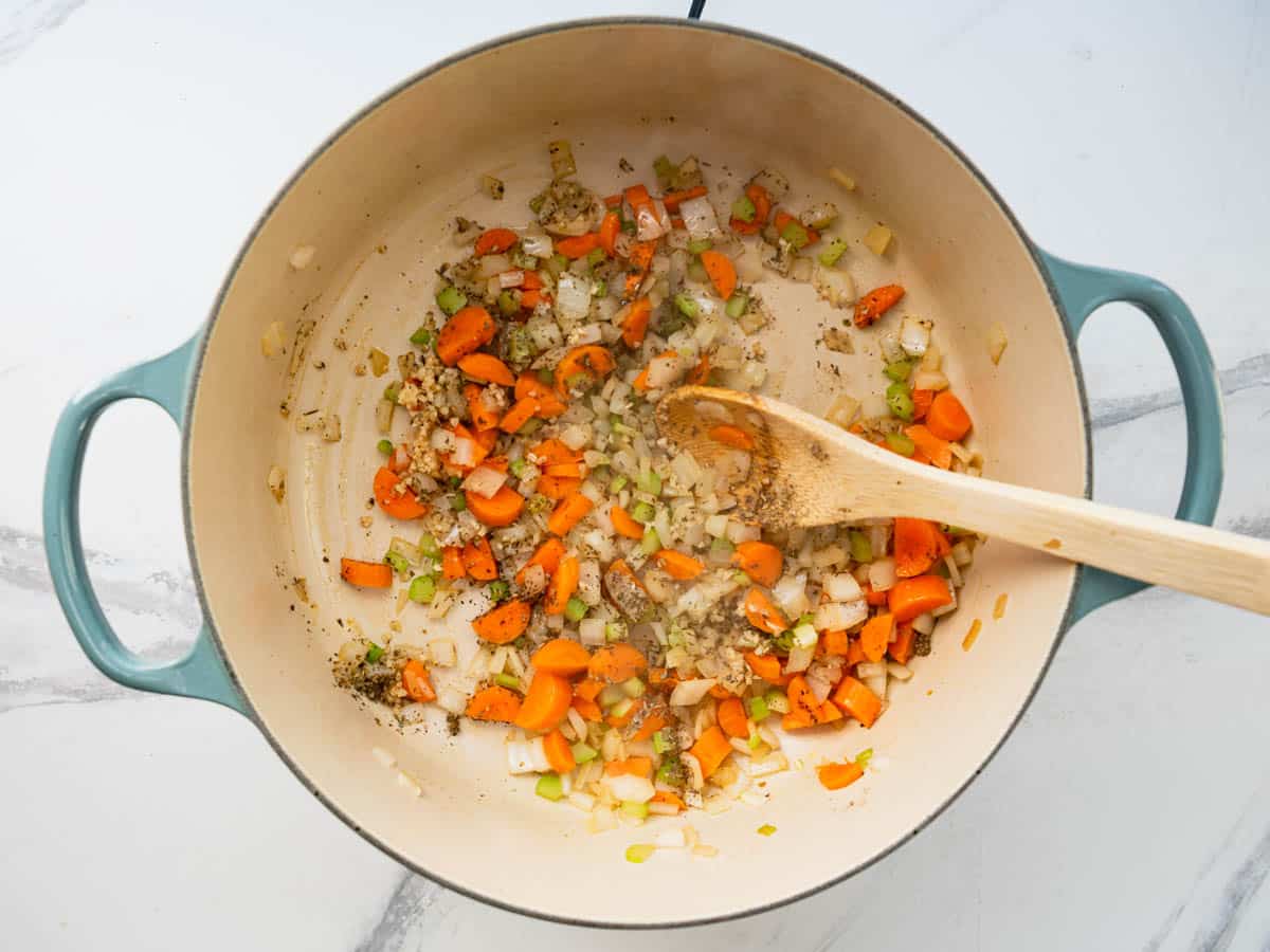 Sauteing the aromatics for a pot of meatball soup.