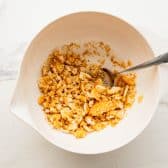 Cracker crumb topping for scalloped corn recipe.