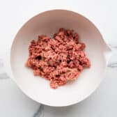 Meatball mixture in a bowl.