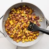 Process shot showing how to make corned beef hash.