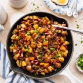 Horizontal overhead image of a skillet of corned beef hash.