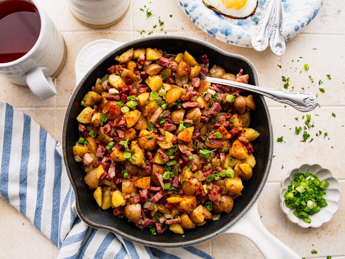 Horizontal overhead image of a skillet of corned beef hash.