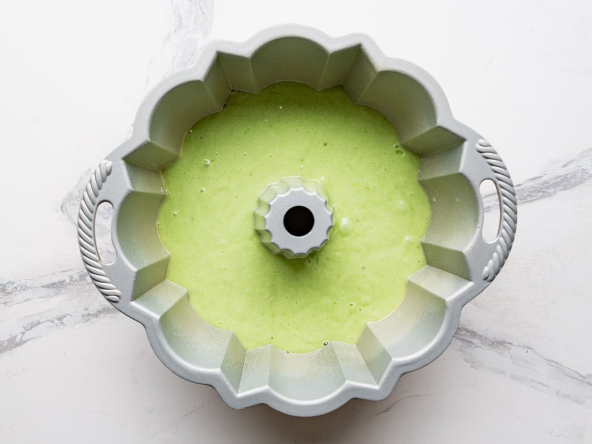 Cake batter poured into the bundt pan.