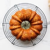 Key lime bundt cake cooling on a wire rack.
