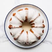 Adding the glaze to a key lime bundt cake.