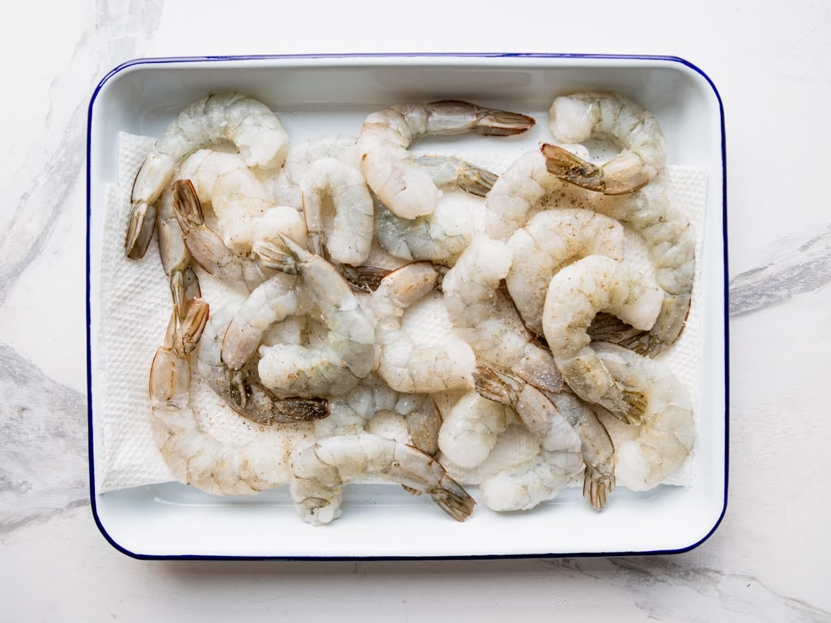 Raw shrimp on a tray.