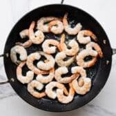 Cooked shrimp in the skillet.